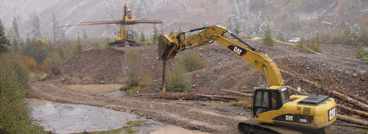 heavy equipment restoring a river bottom